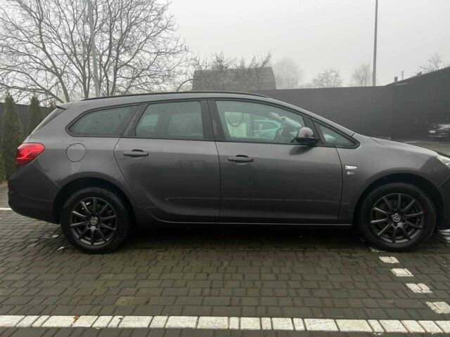 Серый Опель Астра, объемом двигателя 1.7 л и пробегом 241 тыс. км за 5900 $, фото 4 на Automoto.ua