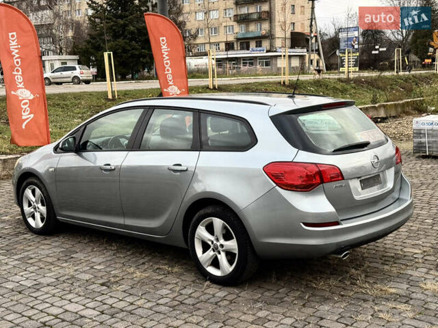 Серый Опель Астра, объемом двигателя 1.4 л и пробегом 220 тыс. км за 6300 $, фото 2 на Automoto.ua