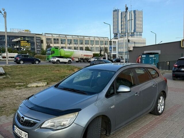 Серый Опель Астра, объемом двигателя 1.69 л и пробегом 235 тыс. км за 5999 $, фото 17 на Automoto.ua