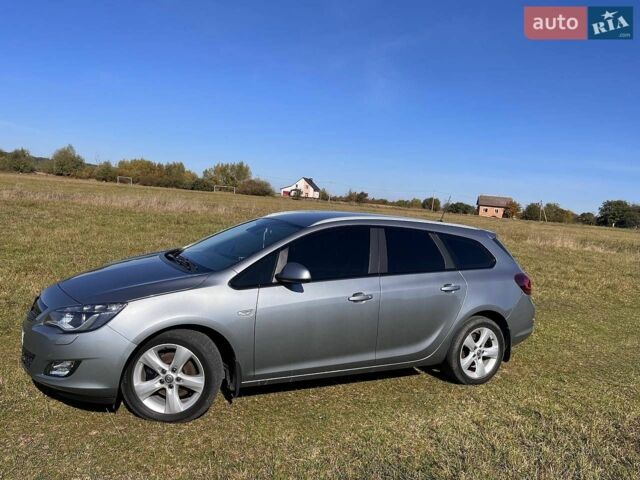 Серый Опель Астра, объемом двигателя 1.69 л и пробегом 169 тыс. км за 8000 $, фото 6 на Automoto.ua