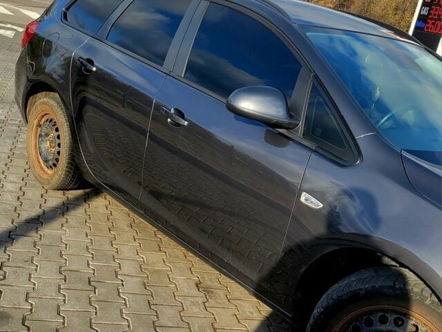 Серый Опель Астра, объемом двигателя 1.4 л и пробегом 249 тыс. км за 7300 $, фото 5 на Automoto.ua