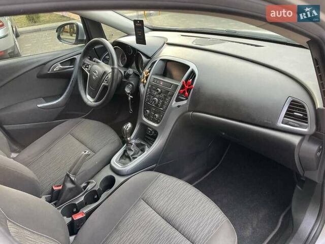 Серый Опель Астра, объемом двигателя 1.2 л и пробегом 306 тыс. км за 5900 $, фото 7 на Automoto.ua