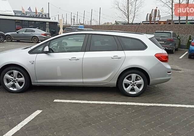 Сірий Опель Астра, об'ємом двигуна 1.4 л та пробігом 128 тис. км за 8650 $, фото 2 на Automoto.ua