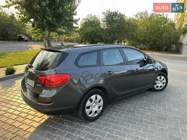 Сірий Опель Астра, об'ємом двигуна 1.3 л та пробігом 300 тис. км за 6499 $, фото 4 на Automoto.ua