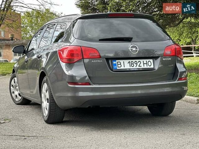 Серый Опель Астра, объемом двигателя 1.3 л и пробегом 220 тыс. км за 7100 $, фото 38 на Automoto.ua