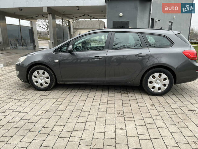 Серый Опель Астра, объемом двигателя 1.7 л и пробегом 235 тыс. км за 7500 $, фото 12 на Automoto.ua