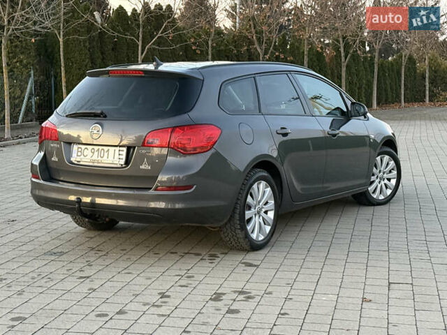 Серый Опель Астра, объемом двигателя 1.7 л и пробегом 215 тыс. км за 7350 $, фото 9 на Automoto.ua