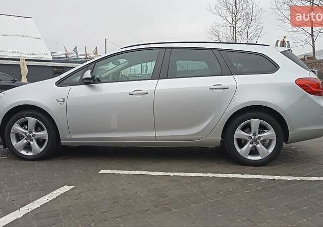 Сірий Опель Астра, об'ємом двигуна 1.4 л та пробігом 128 тис. км за 8650 $, фото 6 на Automoto.ua