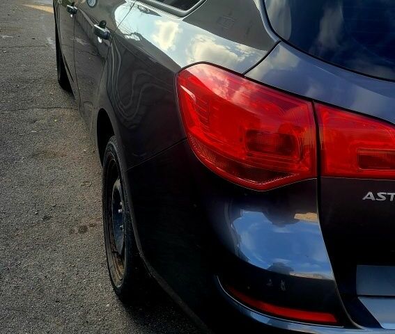 Серый Опель Астра, объемом двигателя 1.4 л и пробегом 249 тыс. км за 7300 $, фото 12 на Automoto.ua