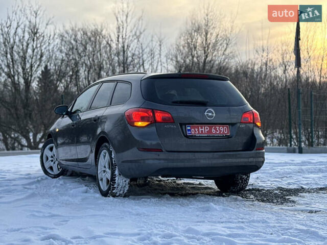 Сірий Опель Астра, об'ємом двигуна 1.7 л та пробігом 234 тис. км за 6990 $, фото 29 на Automoto.ua