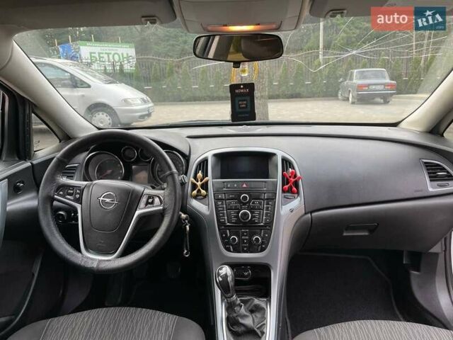Серый Опель Астра, объемом двигателя 1.2 л и пробегом 306 тыс. км за 5900 $, фото 6 на Automoto.ua