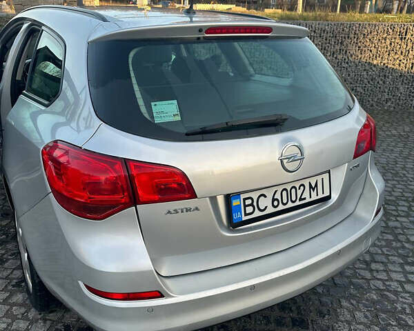 Серый Опель Астра, объемом двигателя 1.69 л и пробегом 334 тыс. км за 8300 $, фото 13 на Automoto.ua