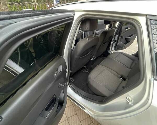 Серый Опель Астра, объемом двигателя 1.2 л и пробегом 306 тыс. км за 5900 $, фото 12 на Automoto.ua