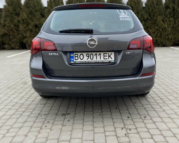 Серый Опель Астра, объемом двигателя 1.7 л и пробегом 327 тыс. км за 7800 $, фото 4 на Automoto.ua