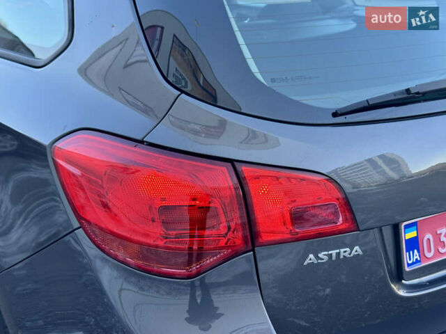Серый Опель Астра, объемом двигателя 1.6 л и пробегом 222 тыс. км за 5950 $, фото 6 на Automoto.ua