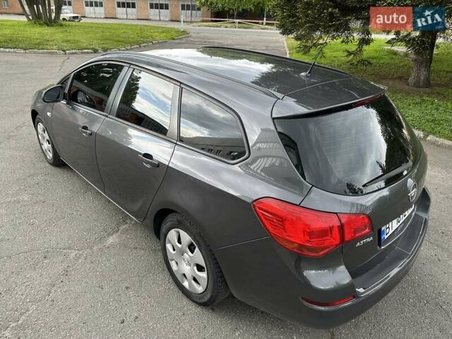 Серый Опель Астра, объемом двигателя 1.3 л и пробегом 220 тыс. км за 7100 $, фото 47 на Automoto.ua