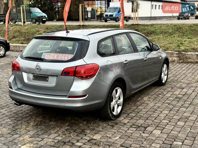 Серый Опель Астра, объемом двигателя 1.4 л и пробегом 220 тыс. км за 6300 $, фото 3 на Automoto.ua