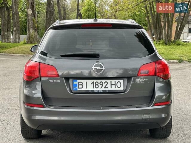 Серый Опель Астра, объемом двигателя 1.3 л и пробегом 220 тыс. км за 7100 $, фото 7 на Automoto.ua