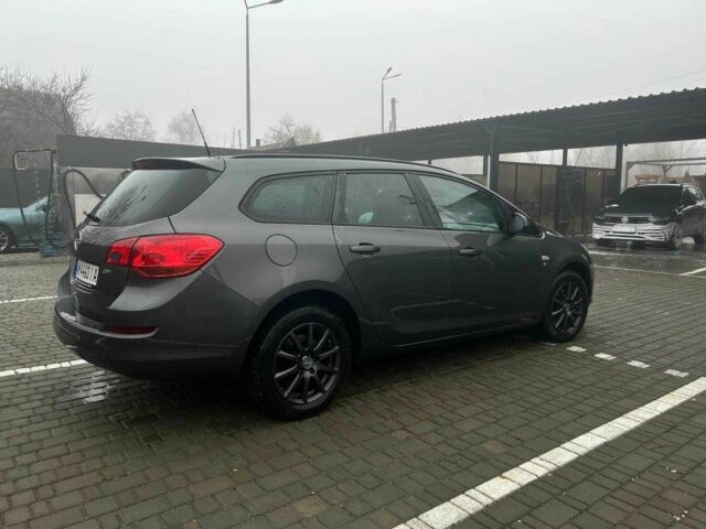 Серый Опель Астра, объемом двигателя 1.7 л и пробегом 241 тыс. км за 5900 $, фото 3 на Automoto.ua