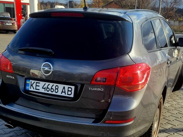Серый Опель Астра, объемом двигателя 1.4 л и пробегом 249 тыс. км за 7300 $, фото 6 на Automoto.ua