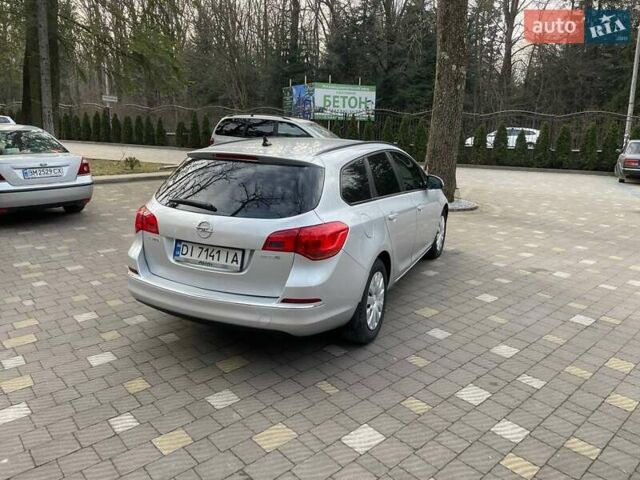 Серый Опель Астра, объемом двигателя 1.2 л и пробегом 306 тыс. км за 5900 $, фото 4 на Automoto.ua