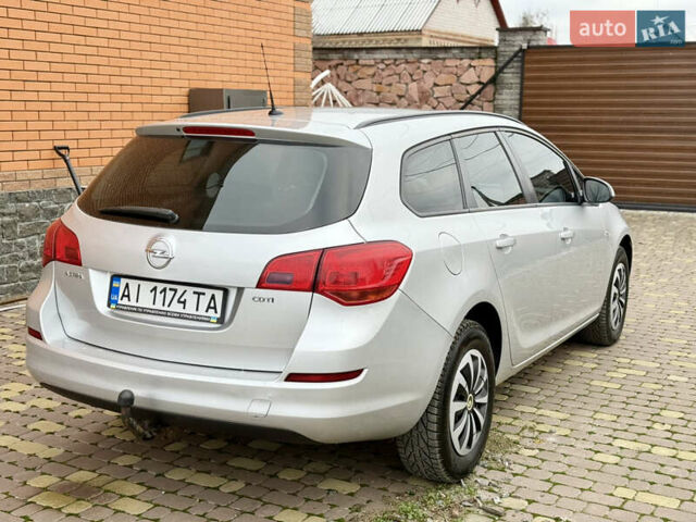 Серый Опель Астра, объемом двигателя 1.7 л и пробегом 252 тыс. км за 5900 $, фото 5 на Automoto.ua