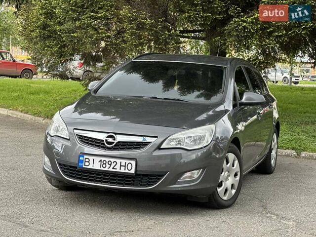 Серый Опель Астра, объемом двигателя 1.3 л и пробегом 220 тыс. км за 7100 $, фото 2 на Automoto.ua