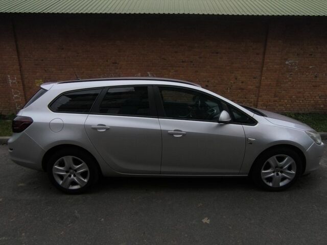 Серый Опель Астра, объемом двигателя 1.7 л и пробегом 255 тыс. км за 6950 $, фото 2 на Automoto.ua