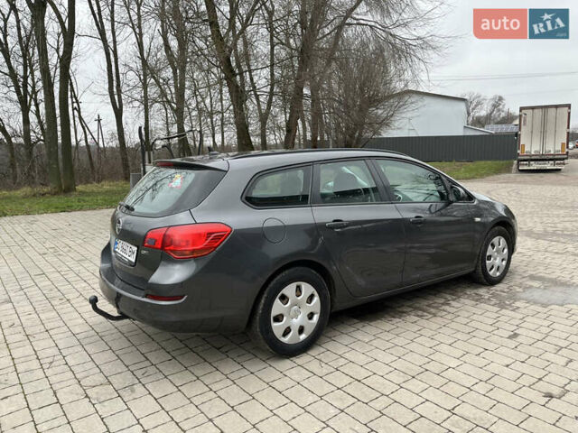 Серый Опель Астра, объемом двигателя 1.7 л и пробегом 235 тыс. км за 7500 $, фото 6 на Automoto.ua