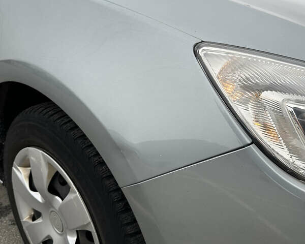 Серый Опель Астра, объемом двигателя 1.69 л и пробегом 178 тыс. км за 6200 $, фото 25 на Automoto.ua