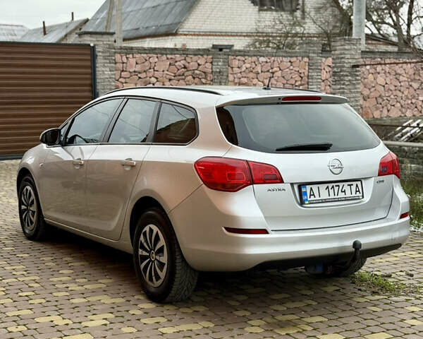 Серый Опель Астра, объемом двигателя 1.7 л и пробегом 252 тыс. км за 5900 $, фото 3 на Automoto.ua