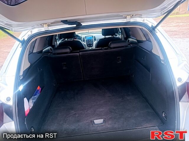 Сірий Опель Астра, об'ємом двигуна 1.7 л та пробігом 25900 тис. км за 6799 $, фото 7 на Automoto.ua