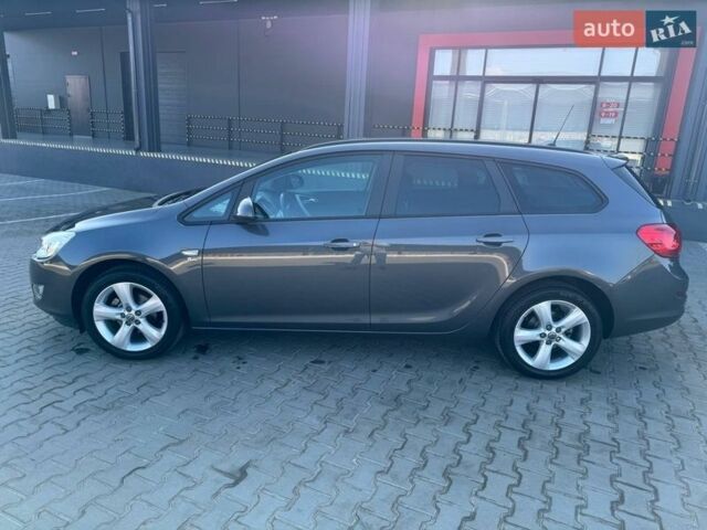 Сірий Опель Астра, об'ємом двигуна 1.4 л та пробігом 86 тис. км за 8600 $, фото 4 на Automoto.ua