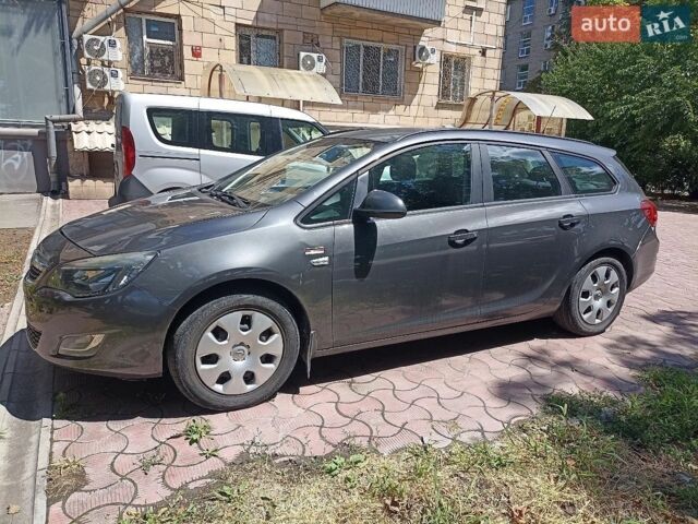 Серый Опель Астра, объемом двигателя 1.2 л и пробегом 186 тыс. км за 5900 $, фото 1 на Automoto.ua