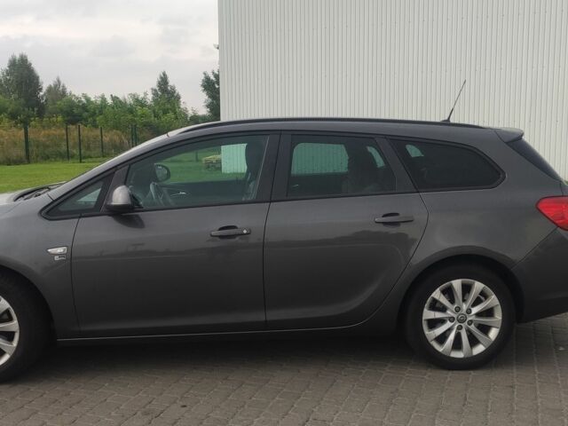 Серый Опель Астра, объемом двигателя 2 л и пробегом 240 тыс. км за 6100 $, фото 2 на Automoto.ua