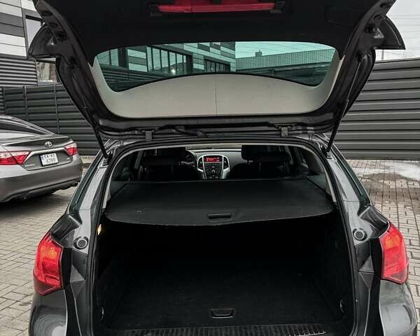 Сірий Опель Астра, об'ємом двигуна 1.4 л та пробігом 190 тис. км за 6999 $, фото 32 на Automoto.ua