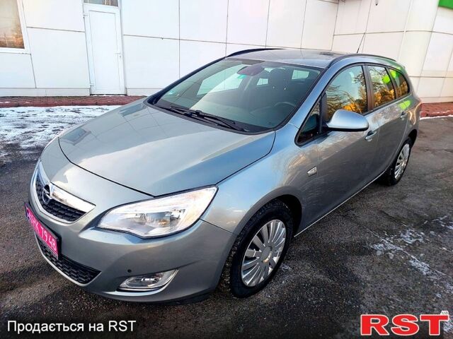 Сірий Опель Астра, об'ємом двигуна 1.4 л та пробігом 21000 тис. км за 7350 $, фото 1 на Automoto.ua