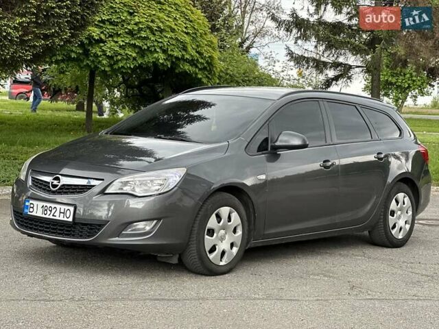 Серый Опель Астра, объемом двигателя 1.3 л и пробегом 220 тыс. км за 7100 $, фото 61 на Automoto.ua