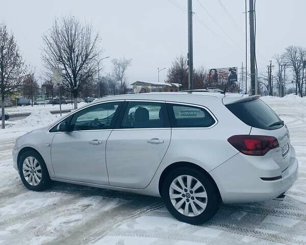 Сірий Опель Астра, об'ємом двигуна 2 л та пробігом 306 тис. км за 7550 $, фото 4 на Automoto.ua