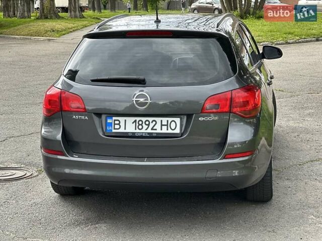 Серый Опель Астра, объемом двигателя 1.3 л и пробегом 220 тыс. км за 7100 $, фото 37 на Automoto.ua