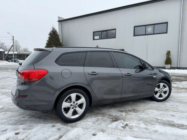 Серый Опель Астра, объемом двигателя 1.3 л и пробегом 226 тыс. км за 6300 $, фото 2 на Automoto.ua