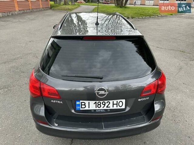 Серый Опель Астра, объемом двигателя 1.3 л и пробегом 220 тыс. км за 7100 $, фото 45 на Automoto.ua