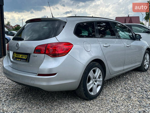 Серый Опель Астра, объемом двигателя 1.69 л и пробегом 243 тыс. км за 7500 $, фото 3 на Automoto.ua