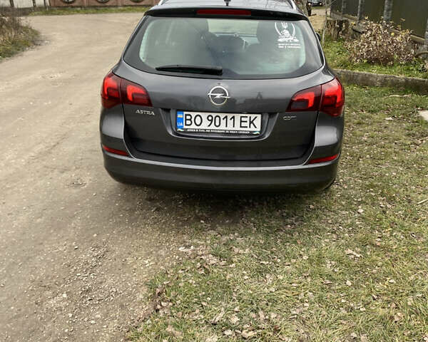 Серый Опель Астра, объемом двигателя 1.7 л и пробегом 327 тыс. км за 7800 $, фото 10 на Automoto.ua
