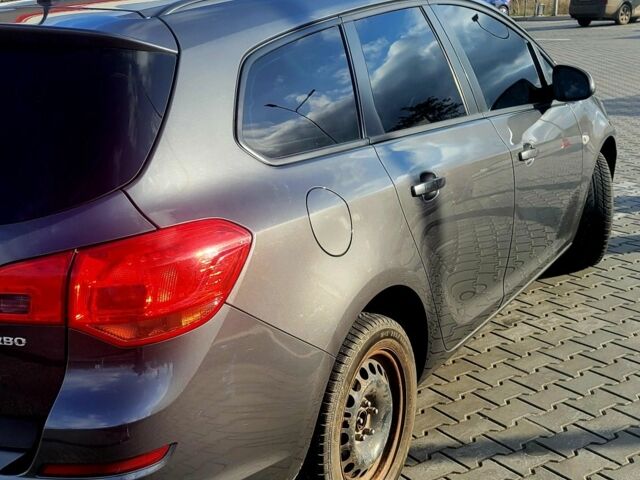 Серый Опель Астра, объемом двигателя 1.4 л и пробегом 249 тыс. км за 7300 $, фото 4 на Automoto.ua