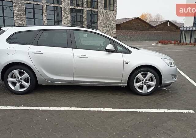 Сірий Опель Астра, об'ємом двигуна 1.4 л та пробігом 128 тис. км за 8650 $, фото 5 на Automoto.ua
