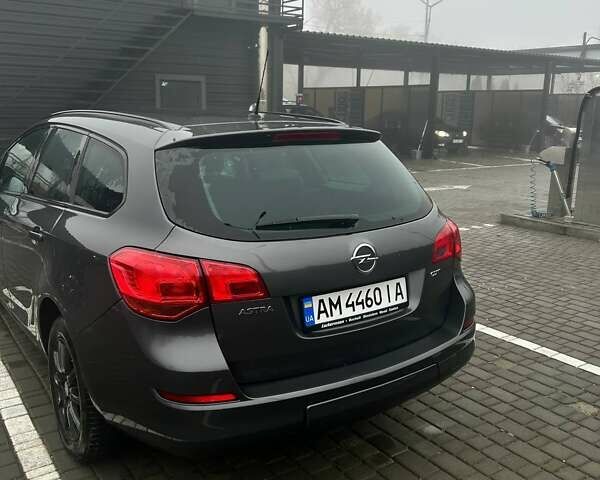 Серый Опель Астра, объемом двигателя 1.69 л и пробегом 241 тыс. км за 5900 $, фото 3 на Automoto.ua