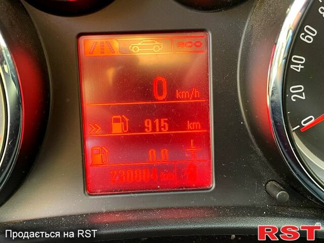 Серый Опель Астра, объемом двигателя 1.2 л и пробегом 230 тыс. км за 5600 $, фото 9 на Automoto.ua