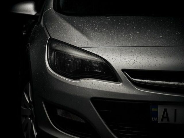 Серый Опель Астра, объемом двигателя 1.2 л и пробегом 230 тыс. км за 5600 $, фото 4 на Automoto.ua