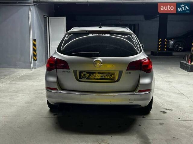 Серый Опель Астра, объемом двигателя 1.69 л и пробегом 275 тыс. км за 6600 $, фото 4 на Automoto.ua